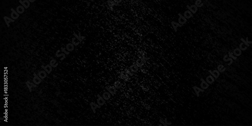 Black dark grunge stone texture with rough, natural crack wall surface background. uneven pattern resembling weathered black rock or charcoal. Panorama black canvas slate texture. marble background.