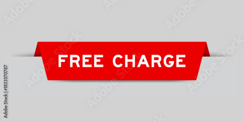 Red color inserted label with word free charge on gray background
