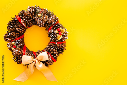 Wallpaper Mural Christmas wreath made of tree bark and dry cones on the wall. New Year DIY decoration Torontodigital.ca