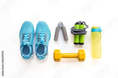 Wallpaper Mural Gym sports equipment with sneakers and dumbbells, top view. Fitness concept Torontodigital.ca