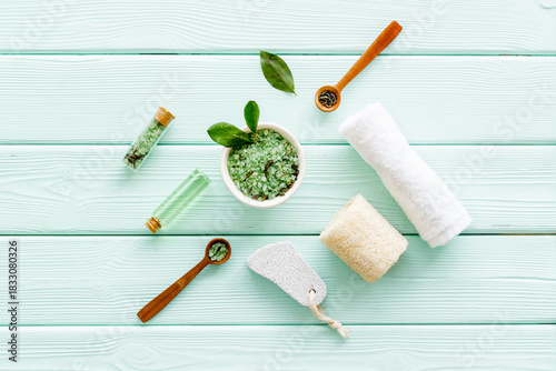 Wallpaper Mural Spa pedicure accessories and organic cosmetics products - tea tree essential oil and sea salt near green leaves top view Torontodigital.ca