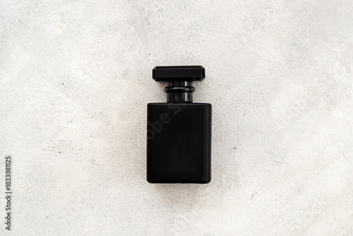 Wallpaper Mural Black man perfume bottle top view. Male fragrance concept Torontodigital.ca