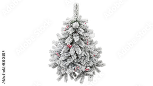 Isolated flocked Christmas tree is decorated with ornaments and candy canes for the holidays