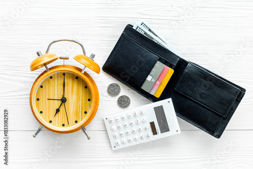 Wallpaper Mural Black wallet with money cash bank card and alarm clock. Time to pay taxes or credit concept Torontodigital.ca