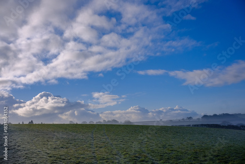Beautiful sunny and cold December morning in the south west, UK. Low lying mist being slowly burnt back by bright autumn, winter sunshine