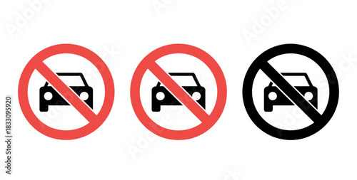 Three distinct no parking signs, two in red and one in black, indicate restrictions on vehicle placement.