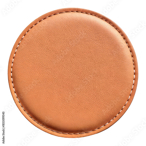 Tan leather coaster with stitched edge, isolated
