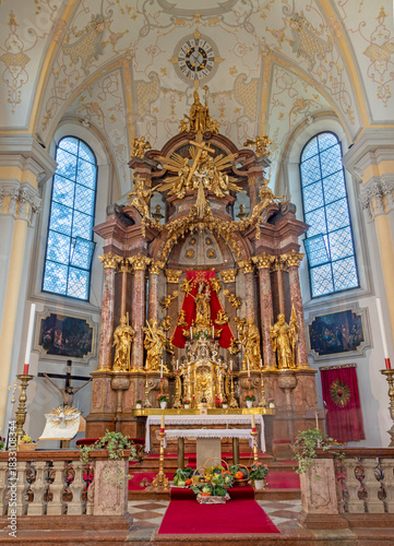 SALZBURG, AUSTRIA - SEPTEMBER 6, 2025: The carved baroque main altar  with th...