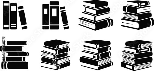Collection of stacked and standing books in silhouette