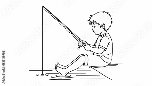 Young boy fishing with a rod, patiently waiting for a catch in the water.
