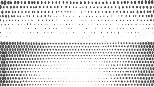 Dark grey oval dots arranged in rows and columns with varying density and size on a white background