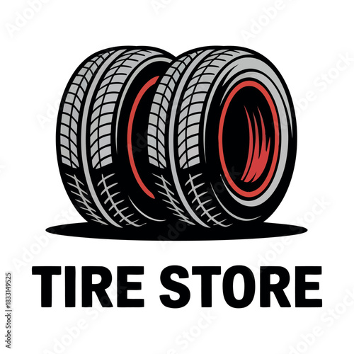 Two new tires are displayed for sale at a tire store.