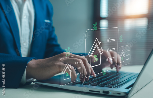 business professional researching real estate rates online, using digital tools to compare mortgage interest, property investment options, and financial planning through modern technology.