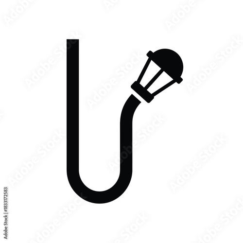 Black silhouette of a street lamp on a white background