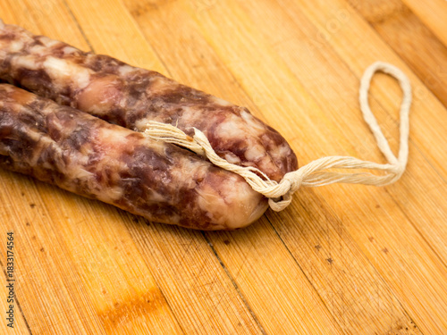 Sausage on a wooden board.