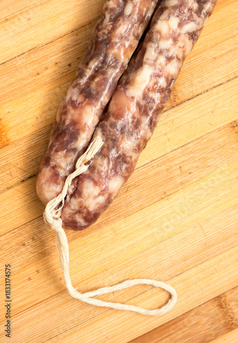 Sausage on a wooden board.