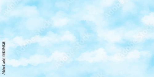 Bright blue summer sky with fluffy white cumulus clouds