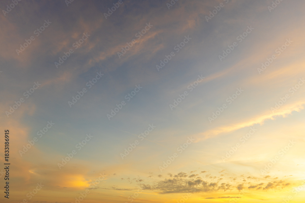 Fototapeta premium Sky and clouds backdrop during sunrise and sunset,Beautiful Panoramic View of Cloudscape during a colorful sunset or sunrise. Taken on the West Coast of British Columbia, Canada.
