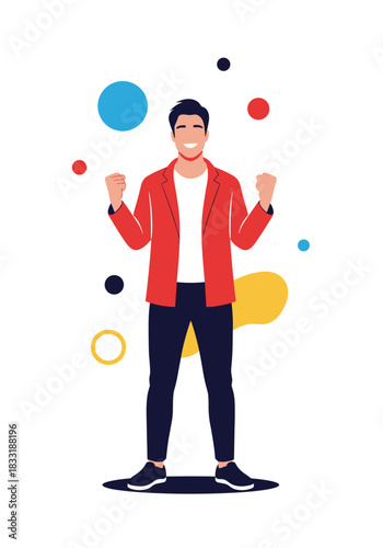 Happy and successful young businessman in a red jacket celebrating a victory or achievement with clenched fists and a wide smile.