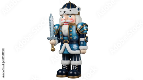 Obraz na plátně Isolated figurine of blue nutcracker in bearskin hat holding sword, holiday home