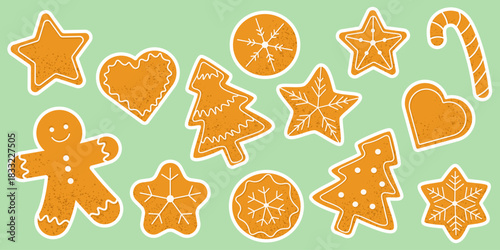 A collection of gingerbread stickers. Christmas holiday sweets with stars, hearts, trees, snowflakes, candy cane and gingerbread man on pastel background