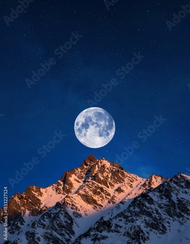 Full Moon Over Majestic Snow-Capped Mountain Peak at Twilight