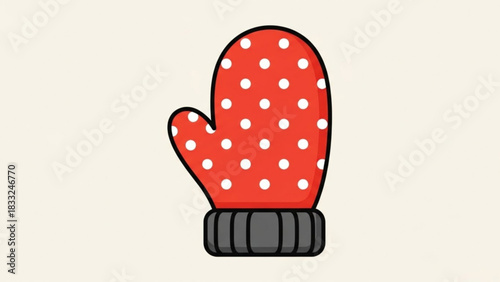 A cute red and white polka dot oven mitt with a ribbed grey cuff isolated on a light cream background perfect for kitchen or winter themes