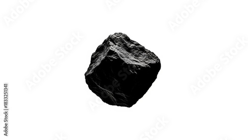 Isolated close up of a dark rock or stone with rough texture against a plain white background in studio shot