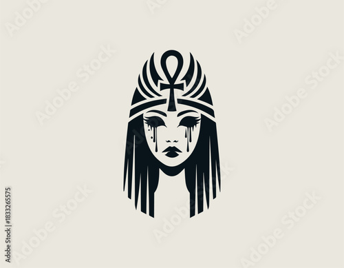 Mysterious black and white portrait of a powerful Egyptian queen wearing an elaborate winged headdress. Ancient mythology concept