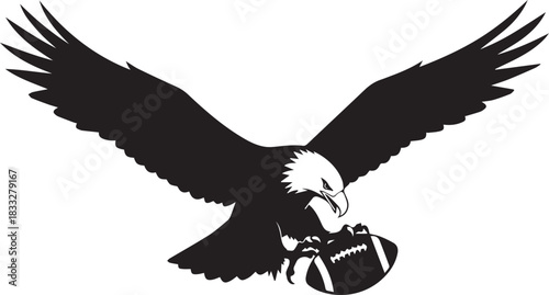 Bald eagle flying with american football in talons