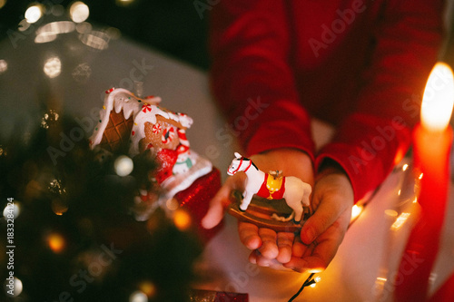 Toy-horse is a symbol of the year 2026 according to the Eastern calendar in the hands of a child.