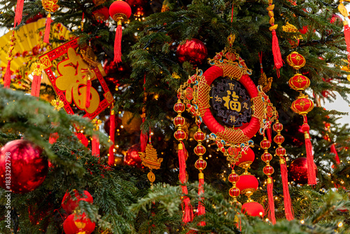 Photography Chinese-style Christmas tree toys on green Christmas tree