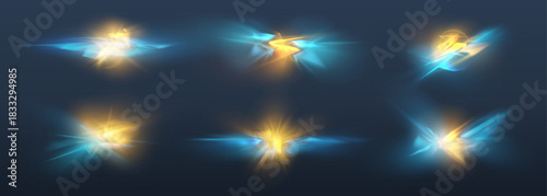 Gold and blue energy light streaks set on dark background, magic glow flares overlay
