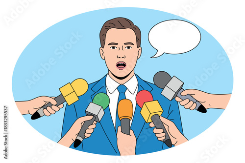 A man wearing a suit speaks into multiple microphones during a press conference.