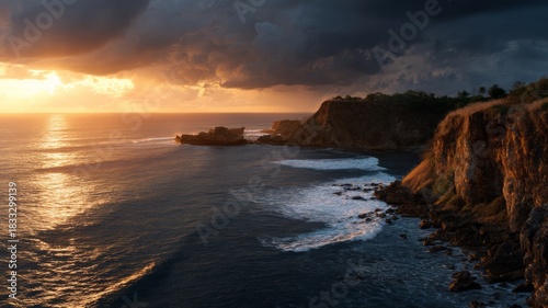 Dramatic coastal sunset over rocky shoreline. AI image