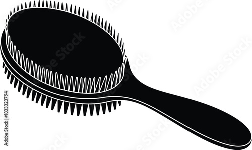 A black hairbrush with a flat rectangular bristle base shown in isolation
