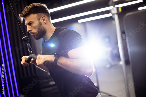 Man focuses on strength tra...
