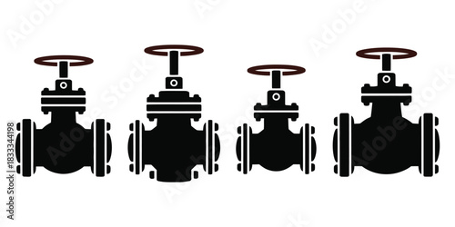 Four Black Industrial Valves with Brown Handles plumbing