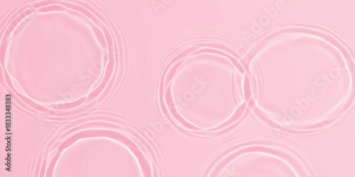 Pink water surface with gentle ripples and soft concentric circles background