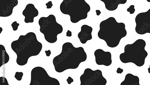 Seamless black and white cow print pattern for textiles and design backgrounds