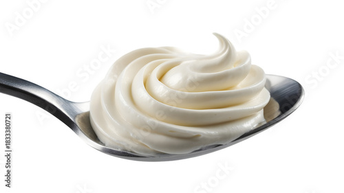 Close up of creamy vanilla soft serve ice cream swirl on a metal spoon isolated on transparent background
