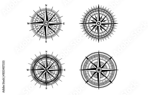 Vintage wind rose compass set nautical travel and exploration symbols hand drawn in engraving sketch style