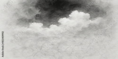 Dramatic cloudscape of white and dark clouds in the blue sky