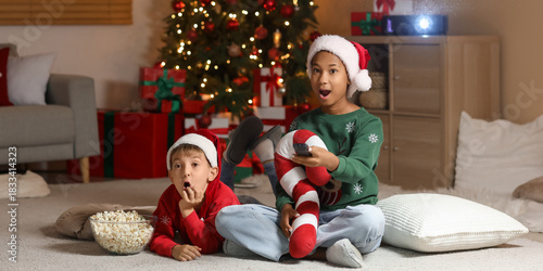 Surprised children in Santa...