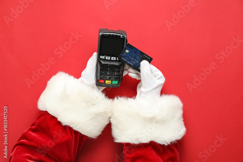 Santa Claus hands with paym...