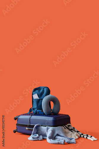 Suitcase with warm clothes,...