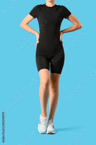 Young woman in cycling jump...