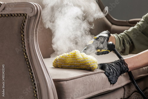 Hot steam mop deep cleaning upholstered sofa seat at home