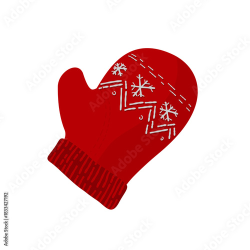 red knitted winter mitten with snowflake ornament