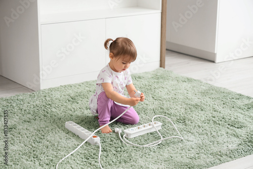 Cute little girl with exten...